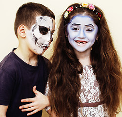 Image showing zombie apocalypse kids concept. Birthday party celebration facepaint on children dead bride, scar face, skeleton together, halloween holiday