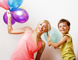 Image showing pretty real family with color balloons on white background, blon