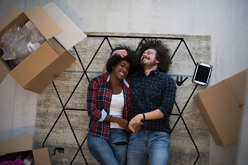 Image showing Top view of attractive young multiethnic couple