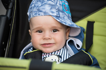 Image showing baby boy sitting in the pram