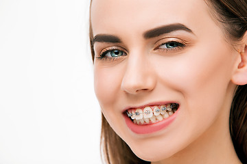 Image showing Beautiful young woman with teeth braces