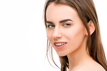 Image showing Beautiful young woman with teeth braces