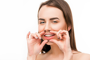 Image showing Beautiful young woman with teeth braces