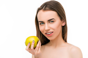 Image showing Beautiful young woman with teeth braces