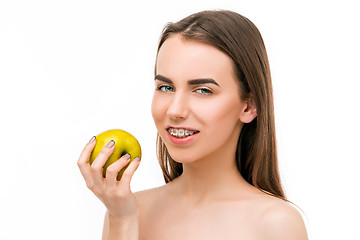 Image showing Beautiful young woman with teeth braces