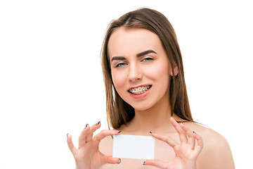 Image showing Beautiful young woman with teeth braces