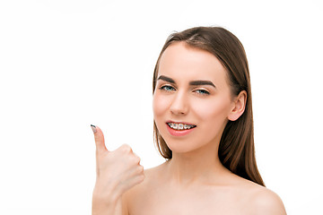 Image showing Beautiful young woman with teeth braces