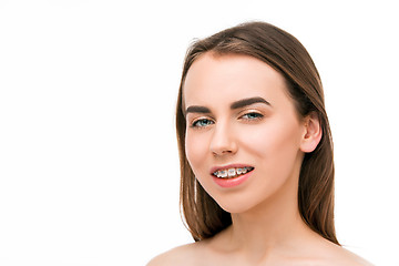 Image showing Beautiful young woman with teeth braces