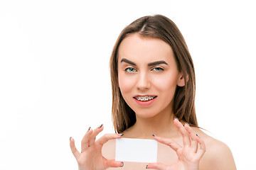 Image showing Beautiful young woman with teeth braces