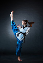 Image showing The karate girl with black belt