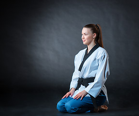 Image showing The karate girl with black belt