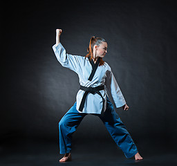 Image showing The karate girl with black belt