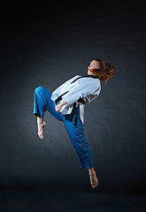 Image showing The karate girl with black belt