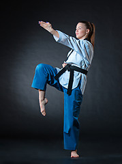 Image showing The karate girl with black belt