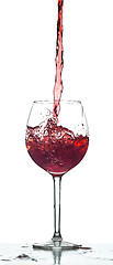 Image showing Red wine splash over white background