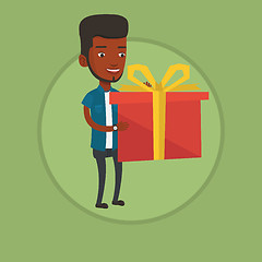 Image showing Joyful man holding box with gift.