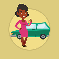 Image showing Woman holding keys to her new car.