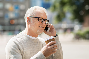 Image showing happy senior man calling on smartphone in city