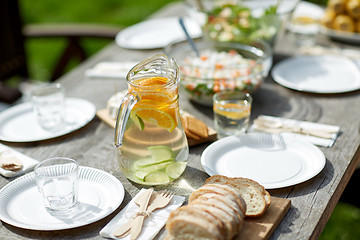 Image showing table with food for dinner at summer garden party