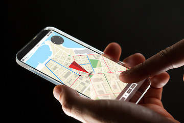 Image showing close up of hand with gps map on smartphone