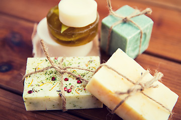 Image showing close up of handmade soap bars on wood