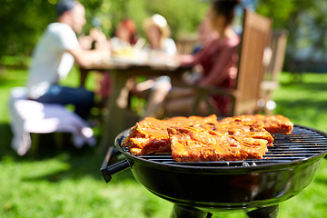 Image showing meat cooking on barbecue grill at summer party