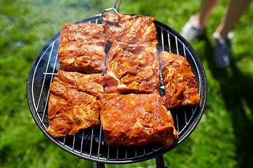 Image showing meat cooking on barbecue grill at summer party