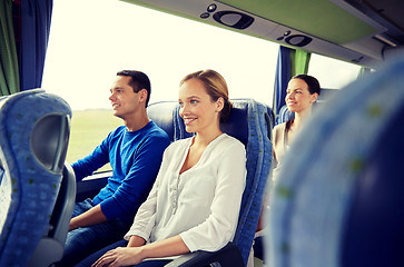 Image showing group of happy passengers in travel bus