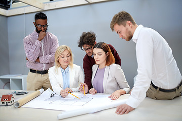 Image showing business team discussing house project at office