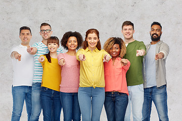 Image showing international group of people pointing on you