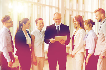 Image showing business people with tablet pc computer at office