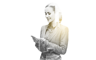 Image showing young smiling businesswoman with smartphone