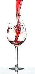 Image showing Red wine splash over white background