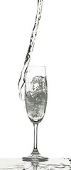 Image showing The water splashing to glass on white background