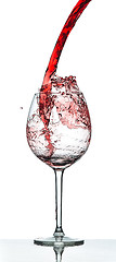 Image showing Red wine splash over white background