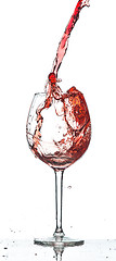 Image showing Red wine splash over white background