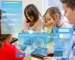 Image showing group of school kids with tablet pc in classroom