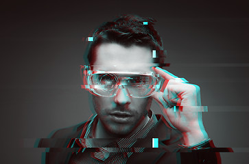 Image showing man in virtual reality or 3d glasses with glitch