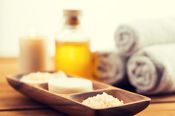 Image showing close up of soap, himalayan salt and scrub in bowl