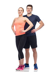 Image showing happy sportive man and woman