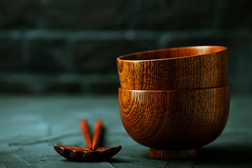 Image showing wood bowl with wooden chopsticks