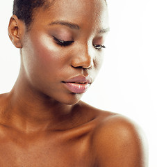 Image showing young pretty african american woman naked taking care of her skin isolated on white background, healthcare people concept 