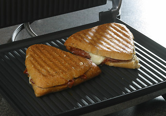 Image showing sandwich on griddle