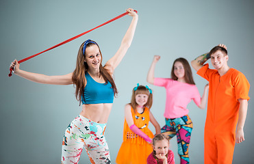 Image showing Group of man, woman and teens dancing hip hop choreography