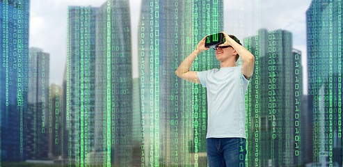 Image showing happy man in virtual reality headset or 3d glasses