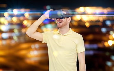 Image showing happy man in virtual reality headset or 3d glasses