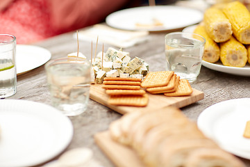 Image showing table with food for dinner at summer garden party