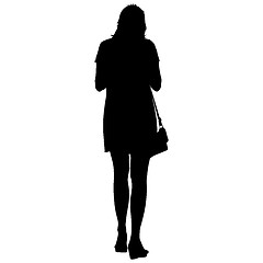 Image showing Black silhouettes of beautiful woman on white background. illustration