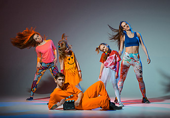 Image showing Group of man, woman and teens dancing hip hop choreography