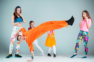 Image showing Group of man, woman and teens dancing hip hop choreography